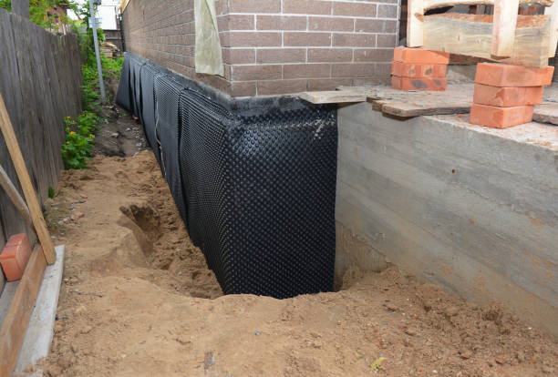 Happy homeowners after waterproofing job in Buffalo Grove